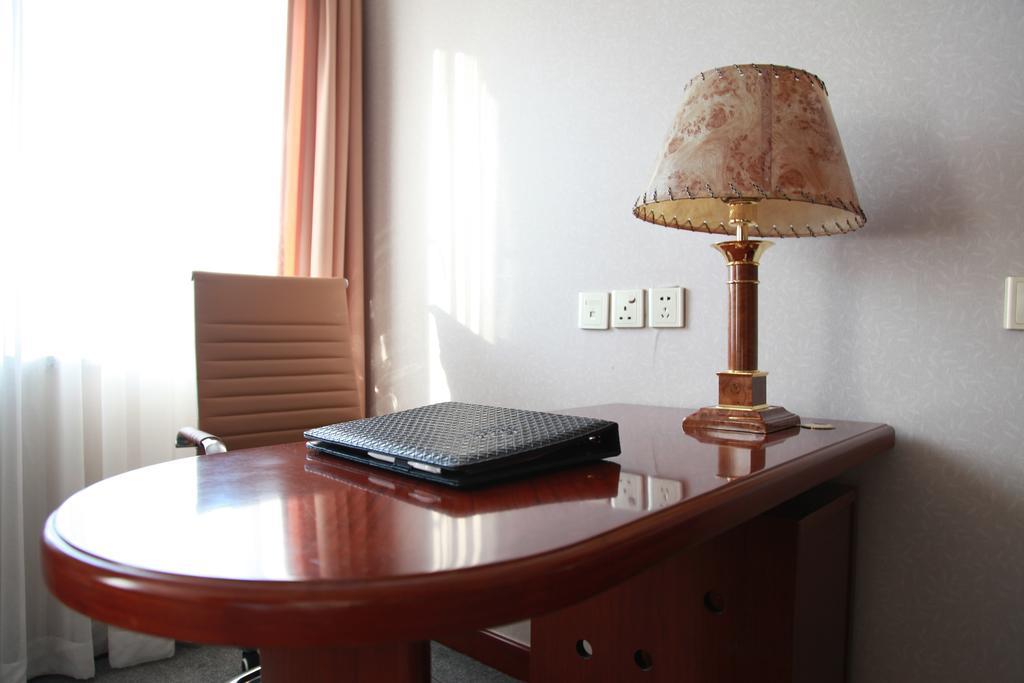 New Gloria Plaza Garden Hotel Harbin Kamer foto