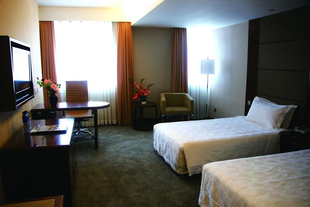 New Gloria Plaza Garden Hotel Harbin Kamer foto