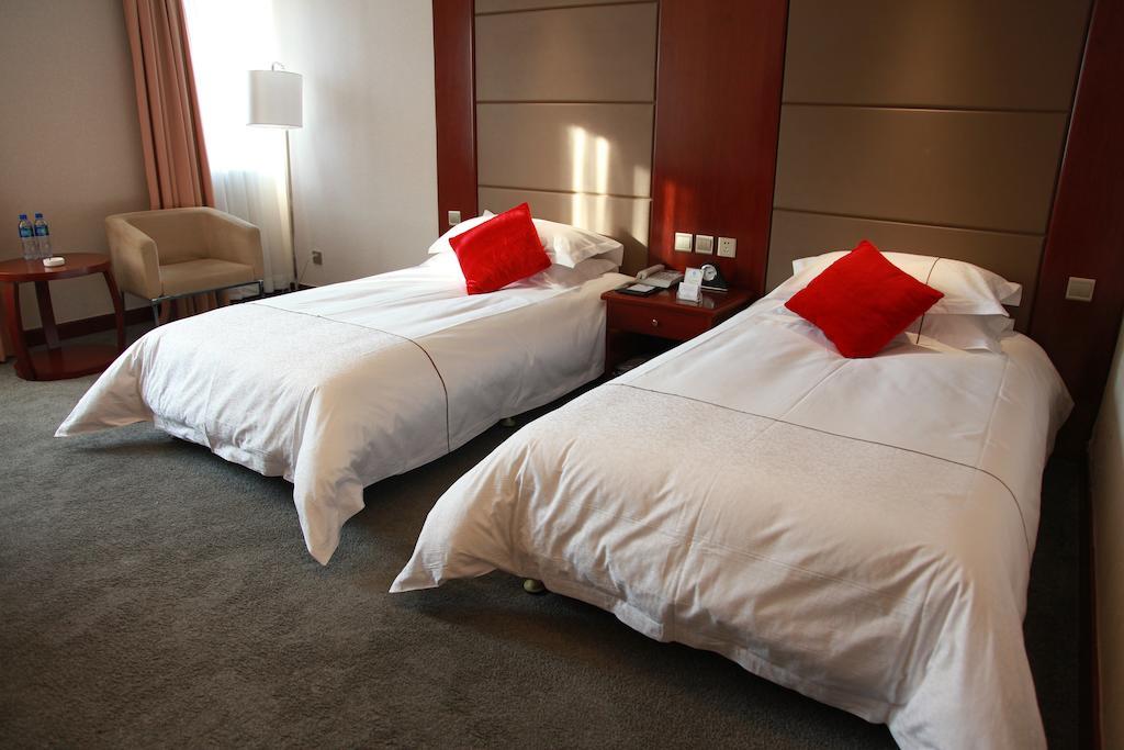 New Gloria Plaza Garden Hotel Harbin Kamer foto
